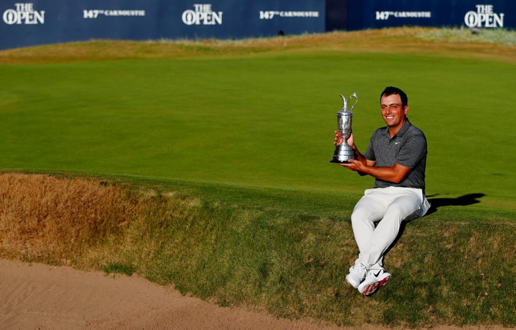 Francesco Molinari celebrates with the Claret Jug after winning the 147th Open Championship REUTERS/Paul Childs