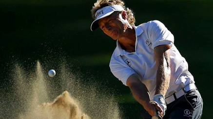 Bernhard Langer birdied three of the final four holes Saturday for a share of the lead with Gene Sauers.