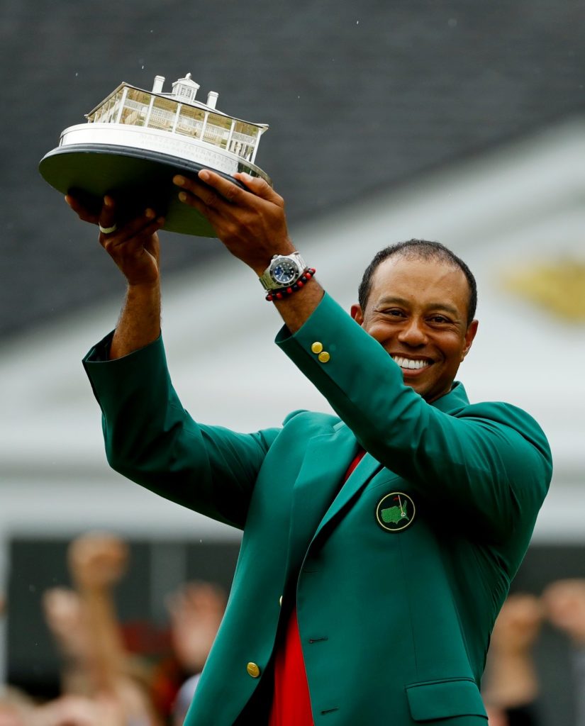 Tiger Woods celebrates winning his fifth Masters title