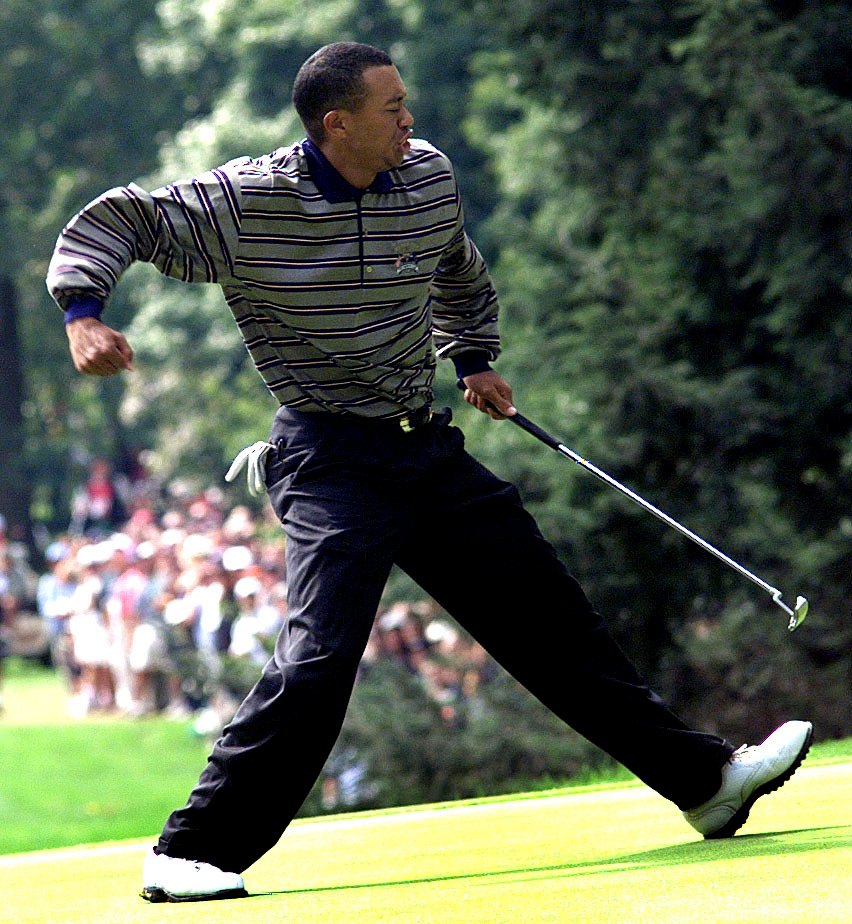 Woods celebrates an eagle putt at the 1999 Ryder Cup