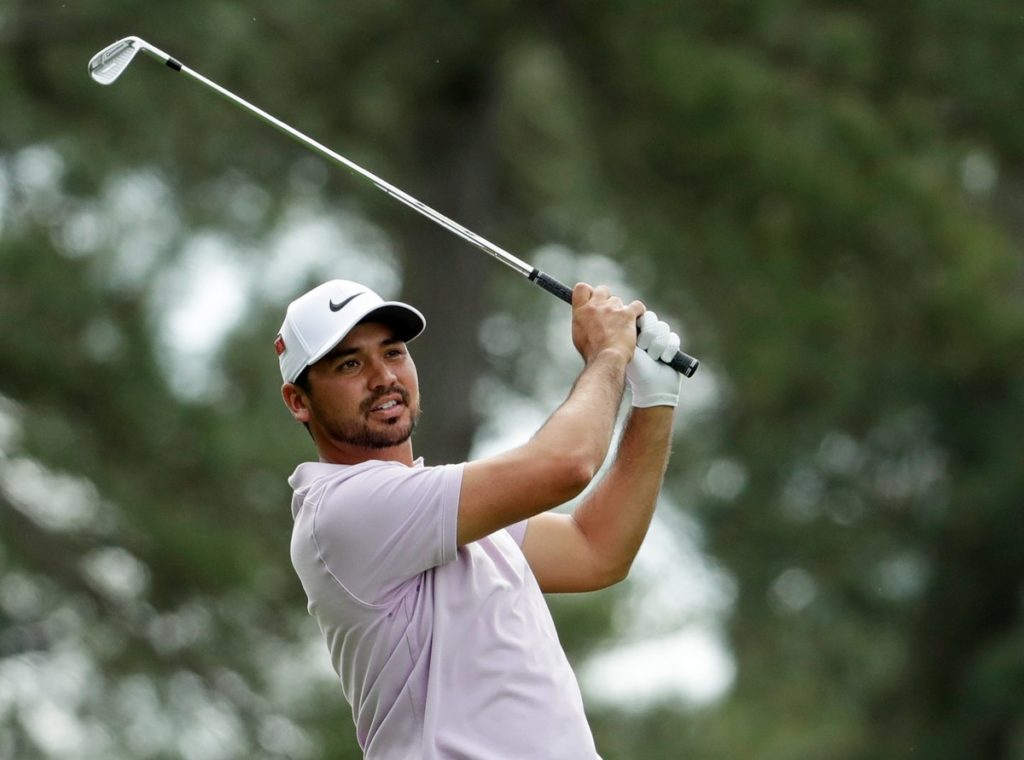 Jason Day overcame back problems to remain in contention at the 83rd Masters
