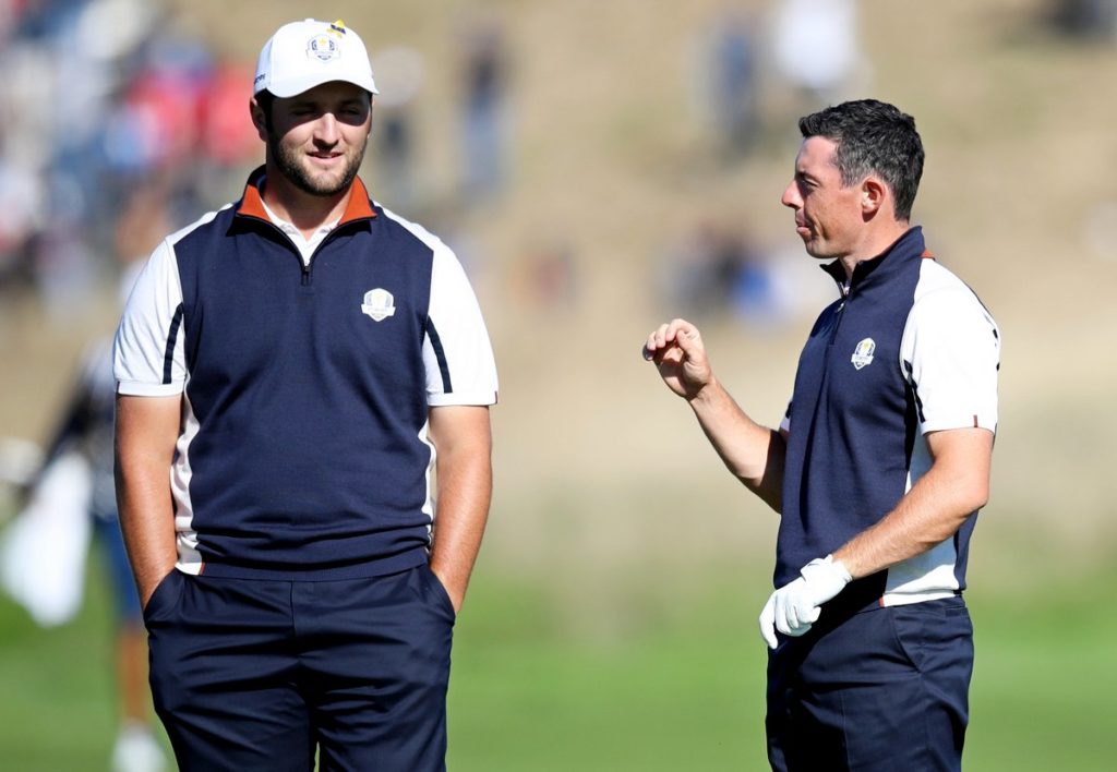 Jon Rahm (left) believes Ryder Cup team-mate Rory McIlroy is the man to beat at Augusta