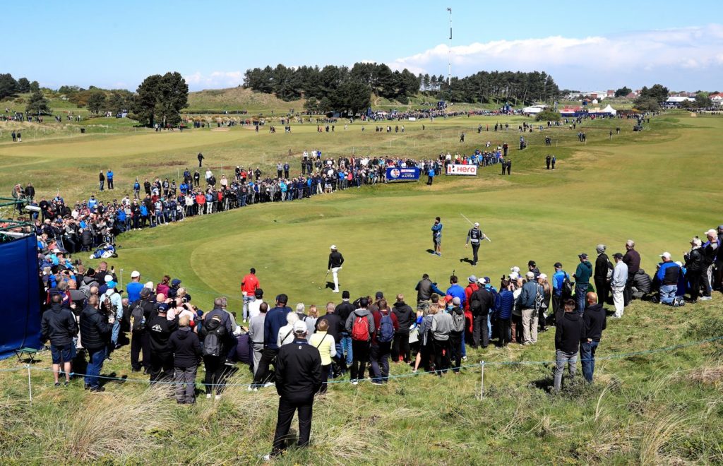 Fans watch England’s Tommy Fleetwood on the 7th green during day three of the Betfred British Masters at Hillside Golf Club, Southport