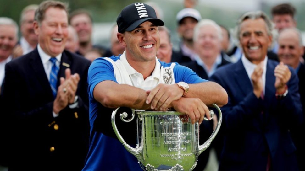 Brooks Koepka poses with the Wanamaker Trophy after winning the US PGA Championship (AP Photo/Julio Cortez)