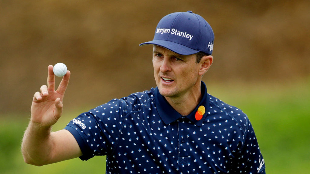 Justin Rose, of England, waves after his putt on the eighth hole during the second round of the U.S. Open. (AP Photo/Marcio Jose Sanchez)