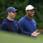 Rory McIlroy (left) and Tiger Woods