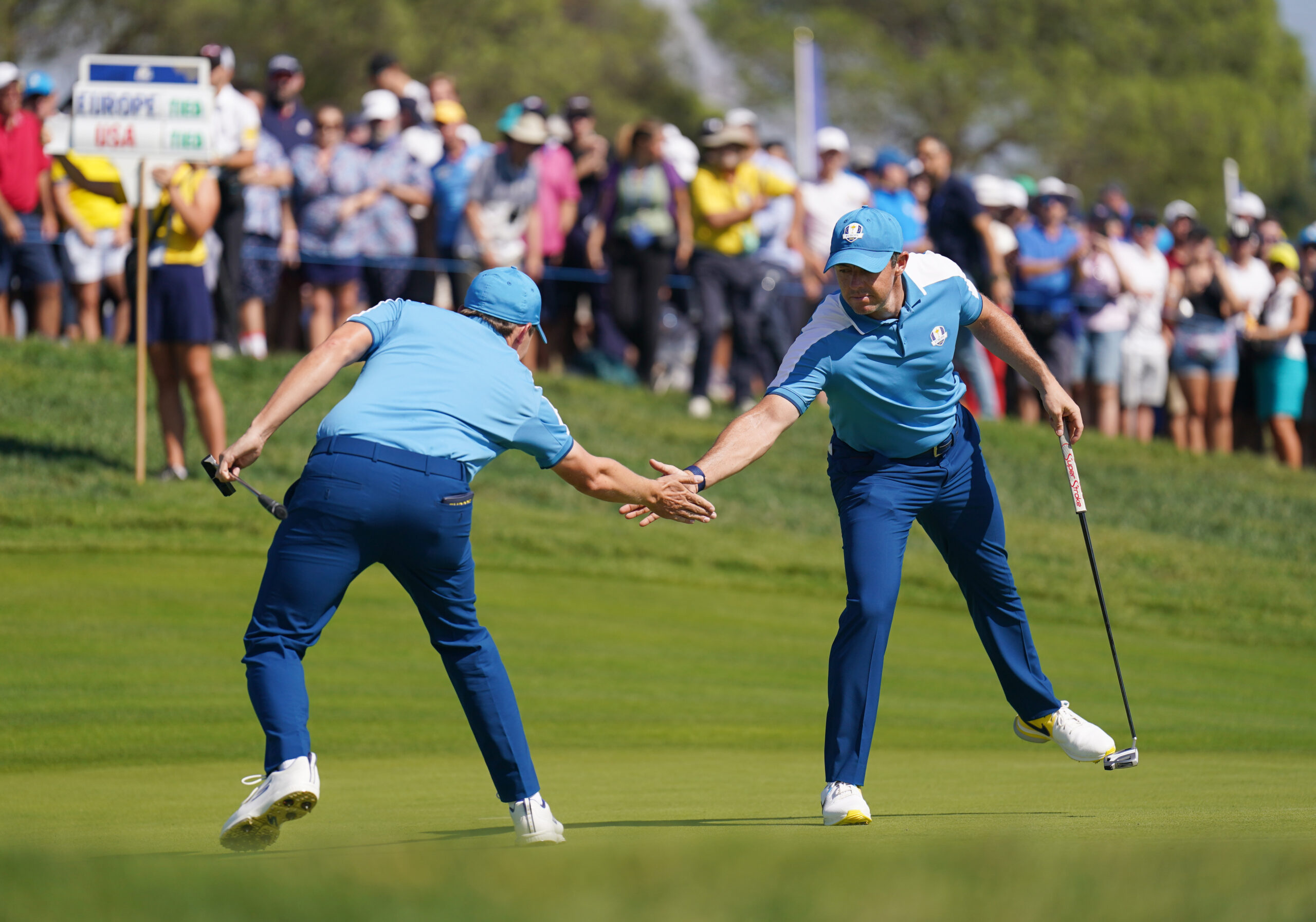 Europe’s Matt Fitzpatrick and Rory McIlroy celebrate on the 2nd during the Fourballs on day one of the 44th Ryder Cup in Rome