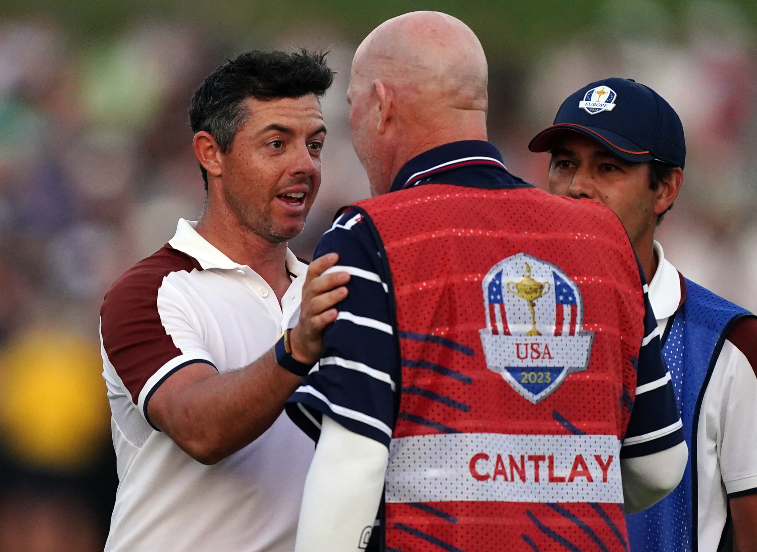 Rory McIlroy argues with Joe LaCava