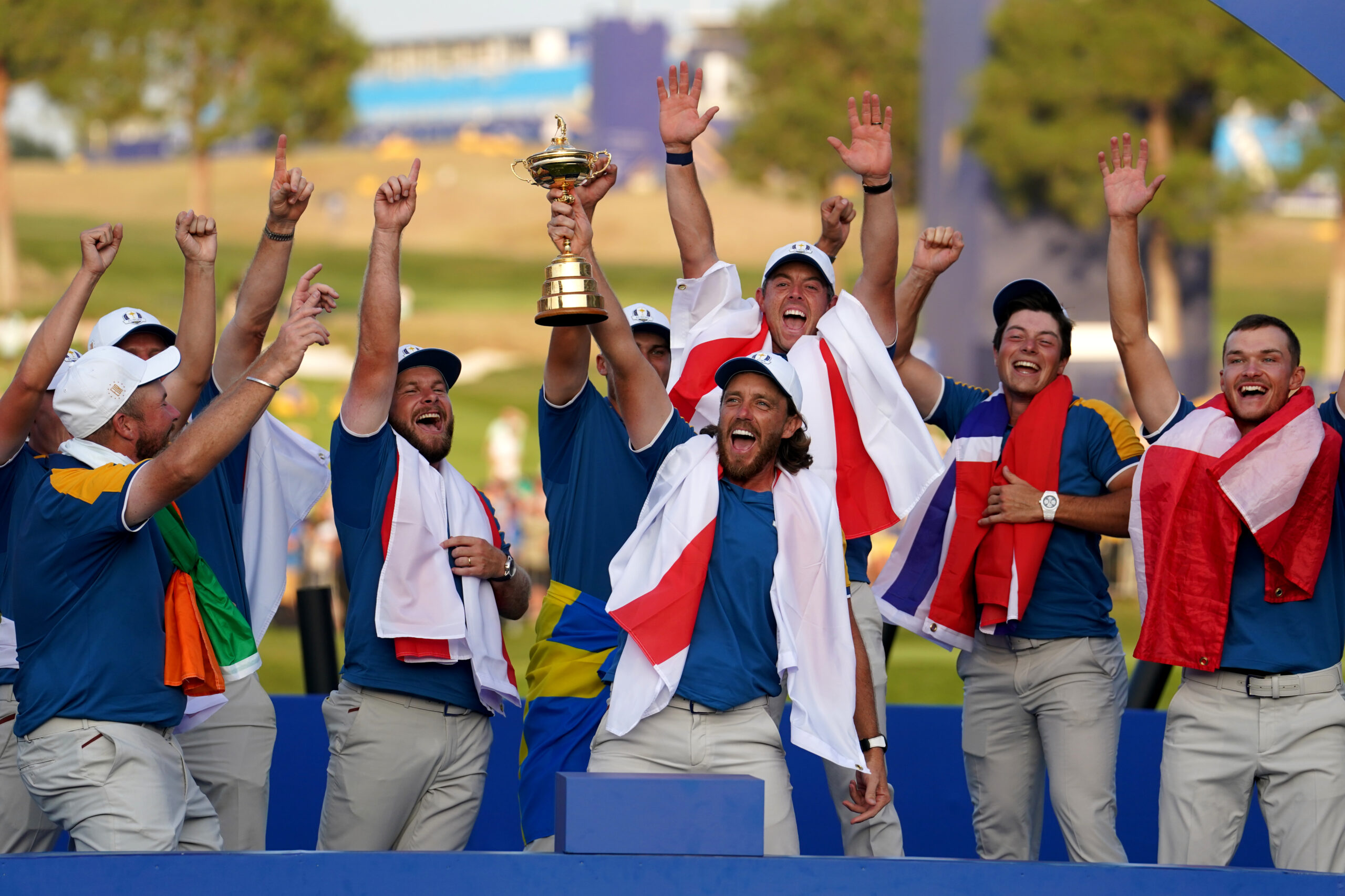 Team Europe’s Tommy Fleetwood lifts the Ryder Cup trophy
