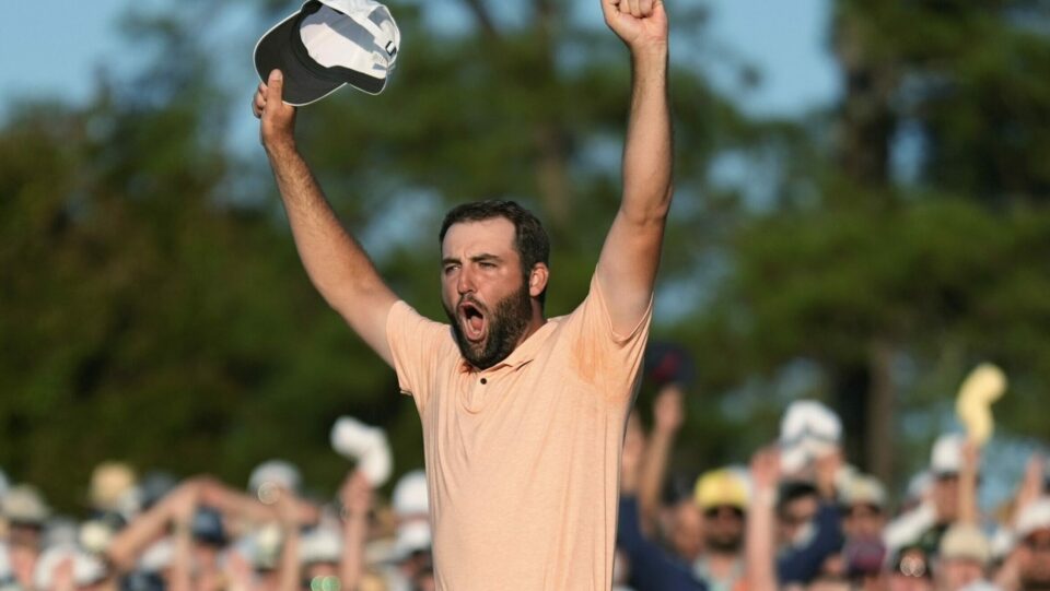 Scottie Scheffler celebrates his win at the Masters golf tournament at Augusta National Golf Club