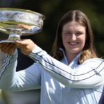 Lottie Woad with the Augusta National Women’s Amateur trophy