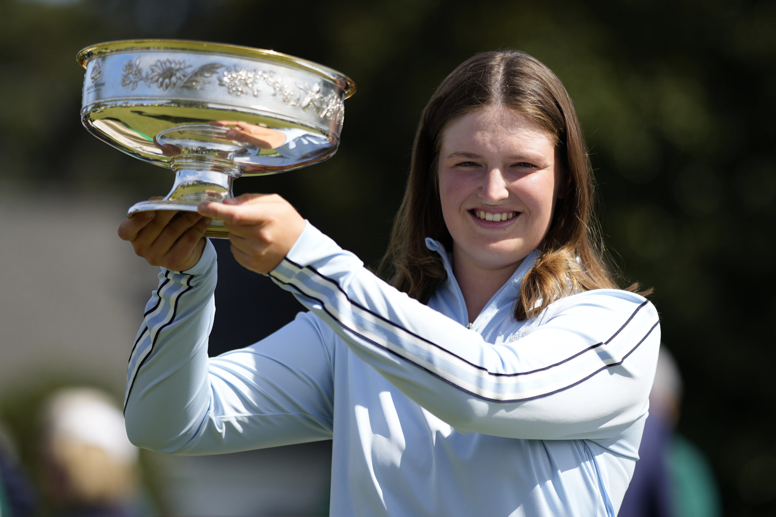 Lottie Woad with the Augusta National Women’s Amateur trophy