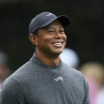 Tiger Woods smiles