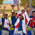 Team Europe's Tommy Fleetwood lifts the Ryder Cup Trophy after Europe regained the Ryder Cup following victory over the USA on day three of the 44th Ryder Cup at the Marco Simone Golf and Country Club, Rome.