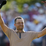 Xander Schauffele celebrates after winning the US PGA Championship at Valhalla