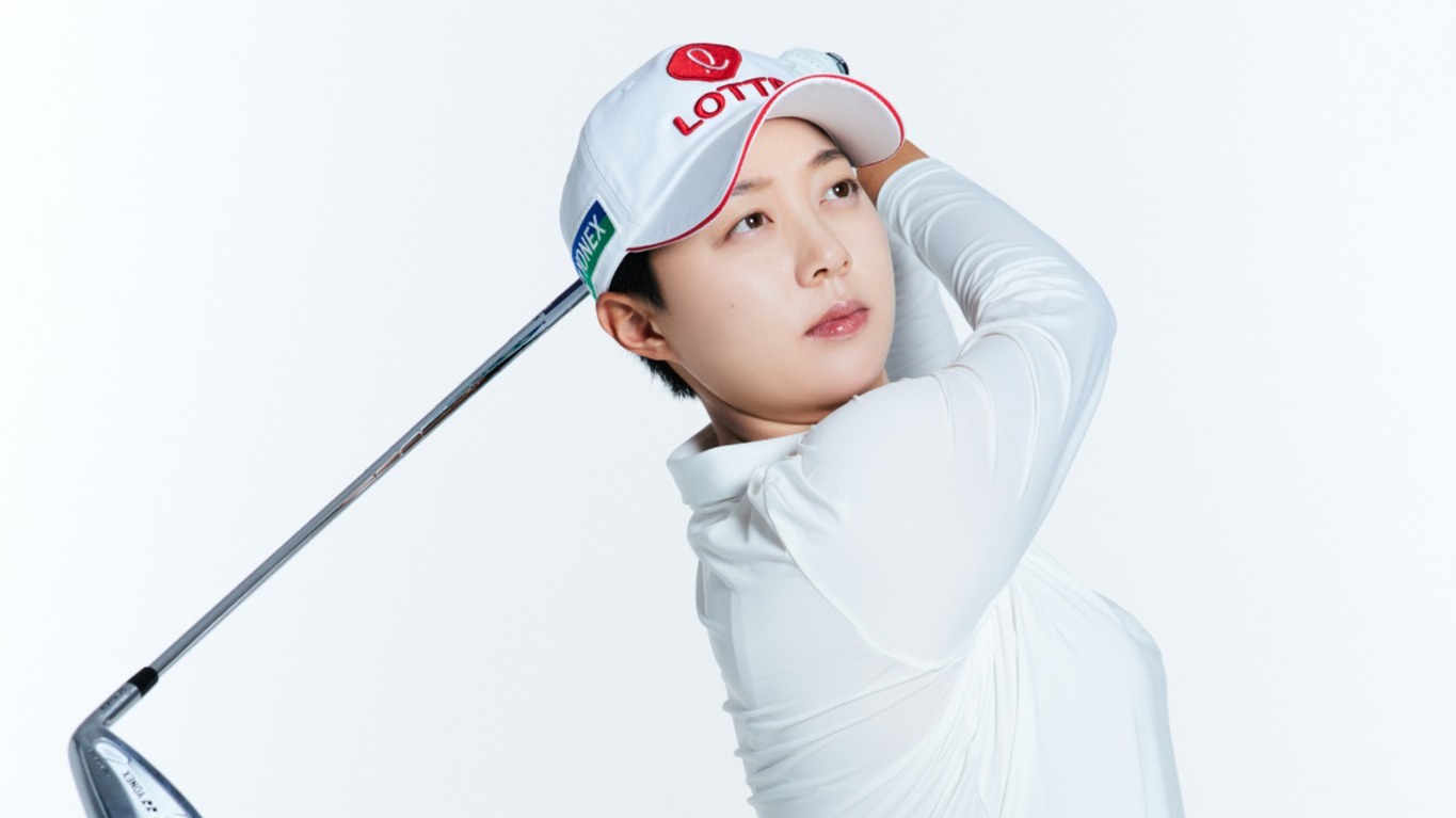 Hyo-Joo Kim holding her finish against a white background