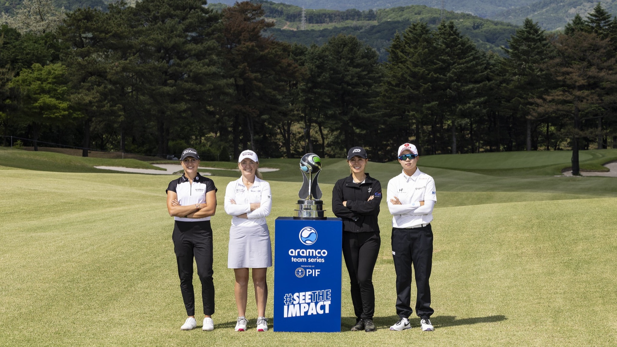 Pauline Roussin, Bronte Law, Danielle Kang and Hyo-Joo Kim pose with the ATS trophy 