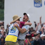 Nick Taylor, second from left, of Canada, reacts after winning the Canadian Open golf tournament on the fourth playoff hole