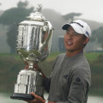 Collin Morikawa holds the Wanamaker Trophy after winning the 2020 PGA Championship golf tournament at TPC Harding