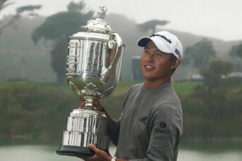 Collin Morikawa holds the Wanamaker Trophy after winning the 2020 PGA Championship golf tournament at TPC Harding