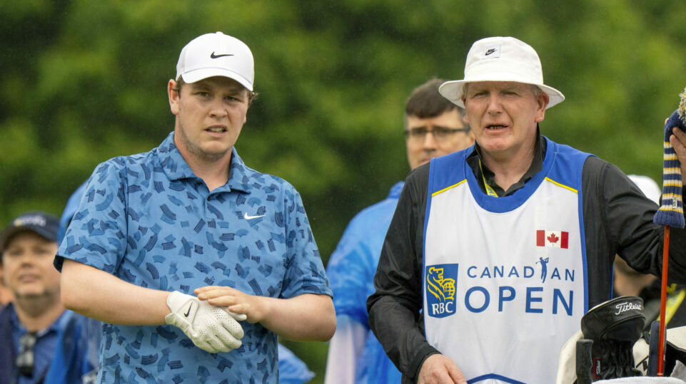 Robert MacIntyre (left) has won the RBC Canadian Open with his father Dougie on the bag