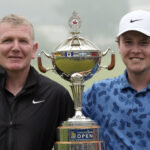 Scotland’s Robert MacIntyre with his father Dougie and the trophy after winning the Canadian Open