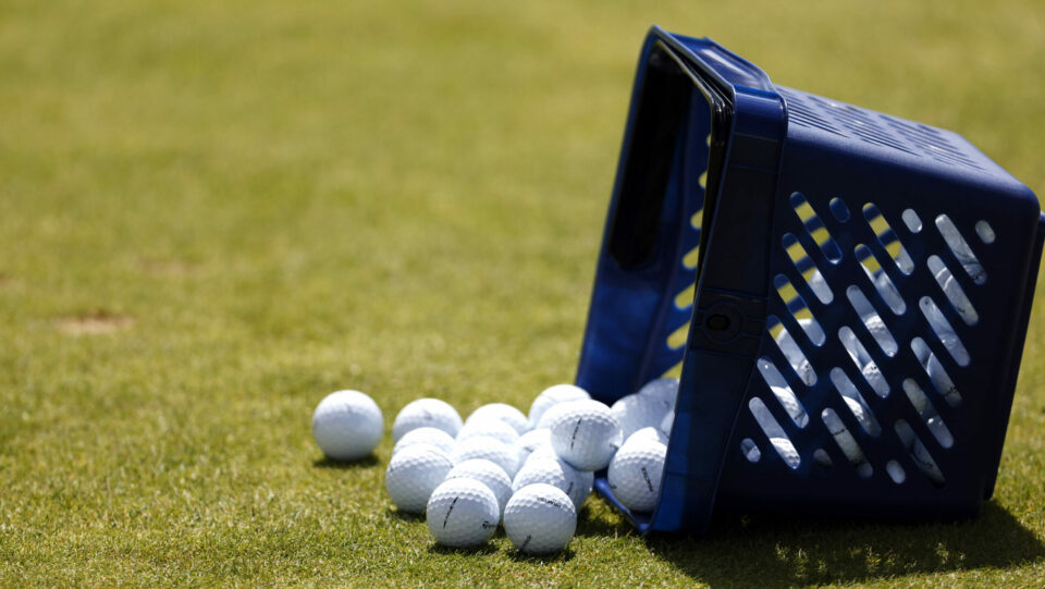 A basket of golf balls. Back-to-back holes-in-one at US Senior Open for golf pro