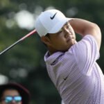 Tom Kim, of South Korea, hits from the first tee during the second round of the Travelers Championship