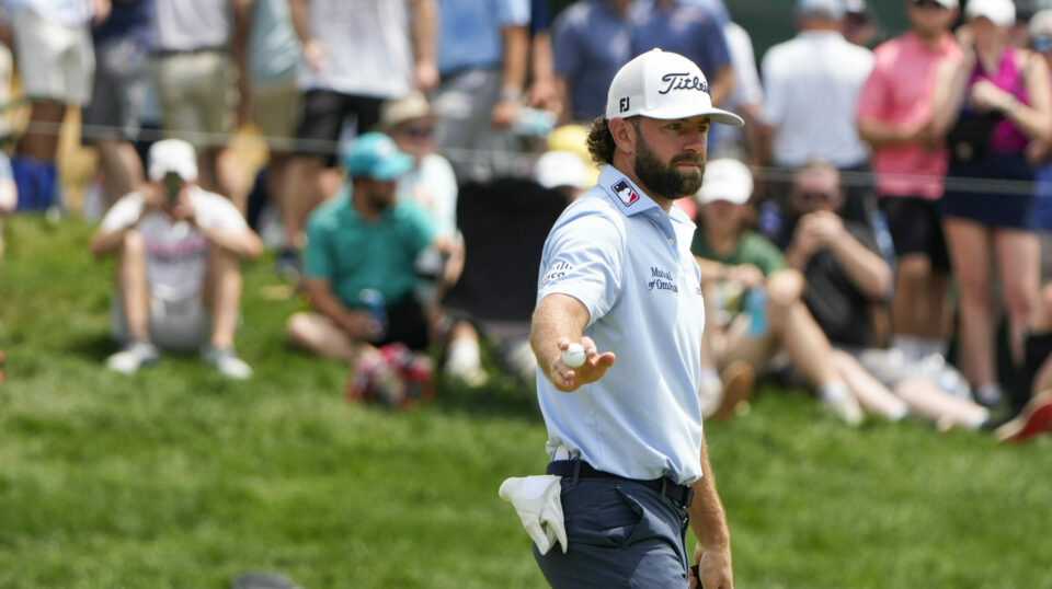 Cameron Young reacts after making a putt on the 17th green during the third round of the Travelers Championship