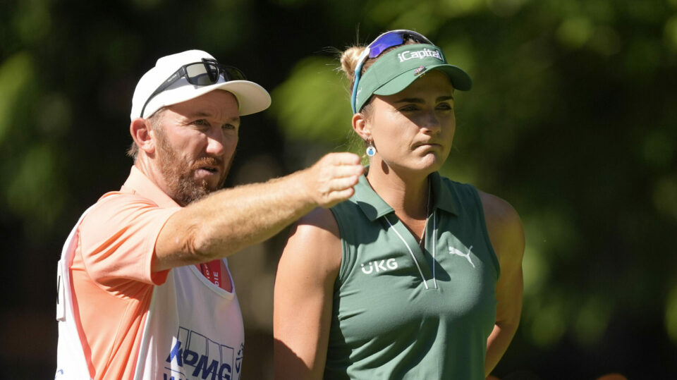 Lexi Thompson talks with her caddie on the 12th tee at the Womens PGA Championship