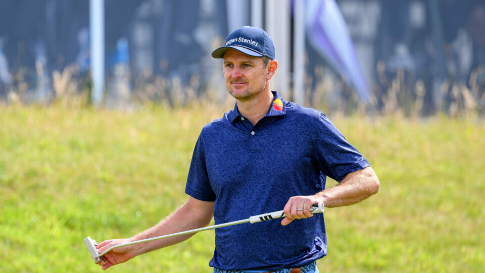 Justin Rose wipes his putter face during the Genesis Scottish Open.