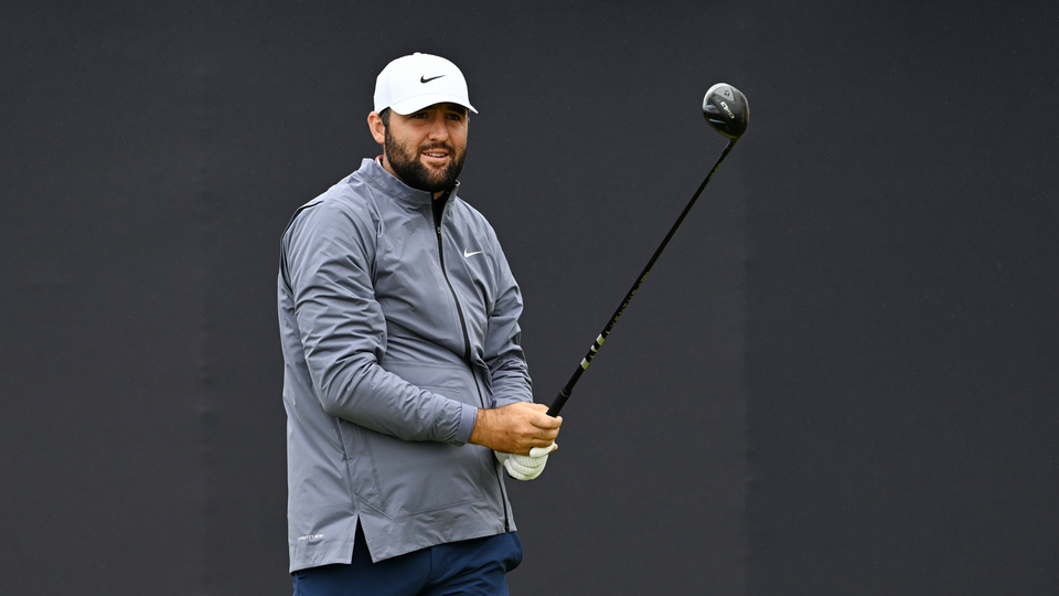 Scottie Scheffler of the United States tees off on the first hole 