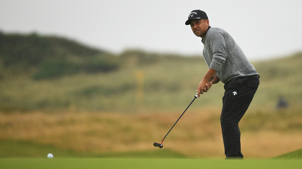 Xander Schauffele of the United States putts on the 13th green on day three of The 152nd Open championship