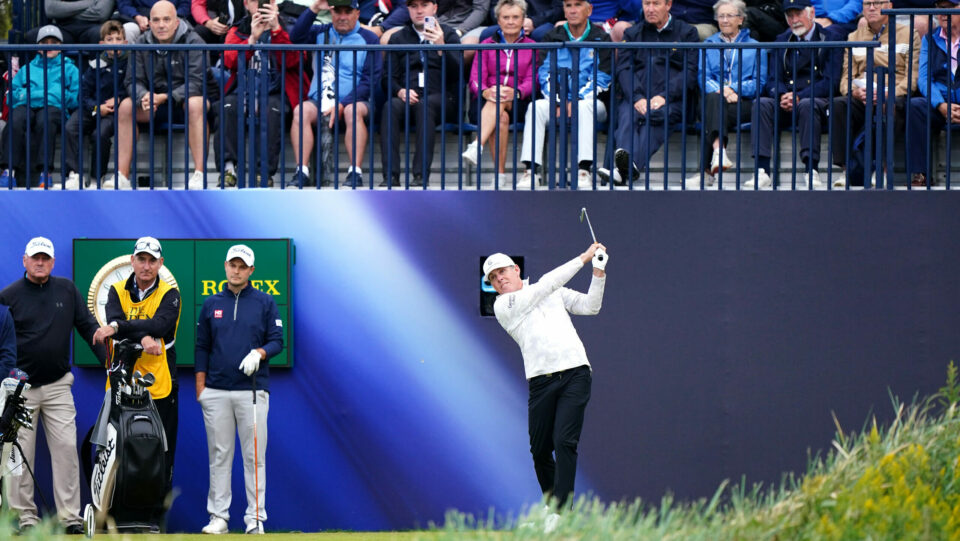 Justin Leonard tees off at The Open in front of a packed grandstand