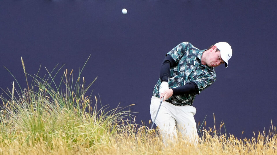Scotland’s Robert MacIntyre plays from the rough on the 18th during day three of The Open at Royal Troon
