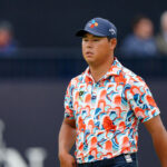 Si Woo Kim on the 18th green