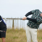 Scotland’s Robert MacIntyre hit an iron off the fairway watched by his caddie on day three of The Open