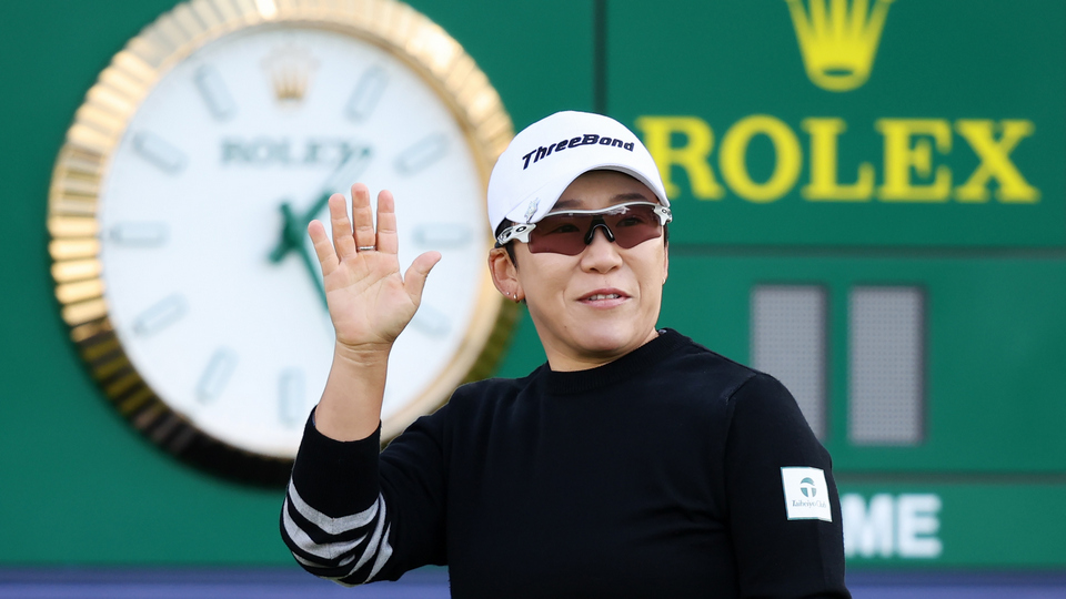 Jiyai Shin of South Korea acknowledges the crowd on the first tee during Day Three of the AIG Women's Open at St Andrews Old Course