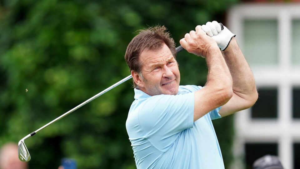 Nick Faldo watches his tee shot