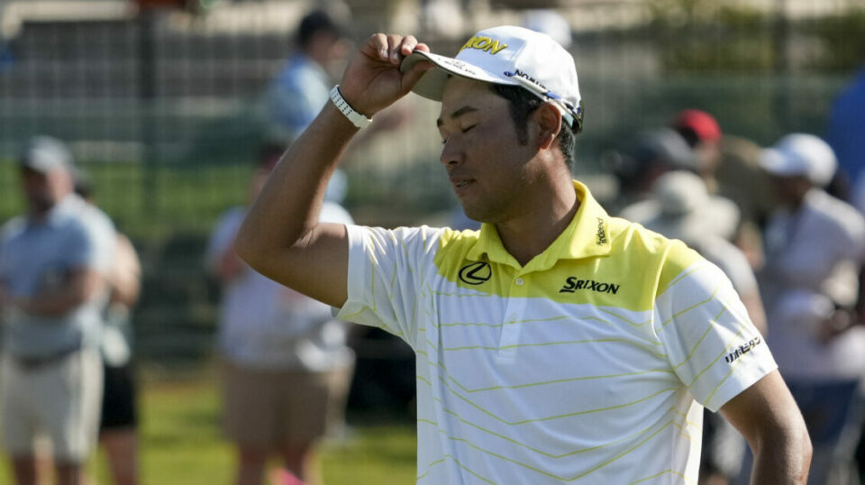 Hideki Matsuyama celebrates his winning putt to claim victory at the FedEx St Jude Championship