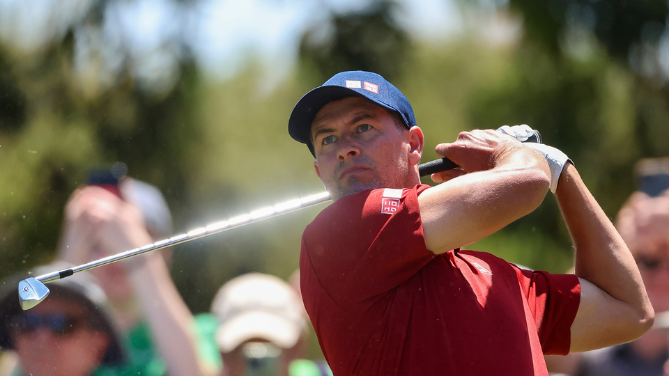 Australia's Adam Scott tees off on the 7th hole during the Australian Open