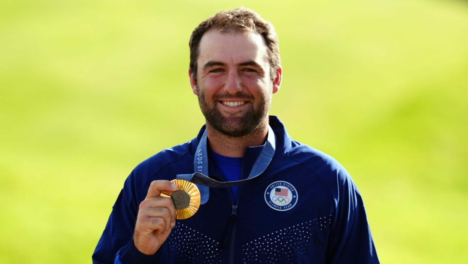 USA’s Scottie Scheffler holds his gold medal after winning the Paris 20204 Olympic golf tournament